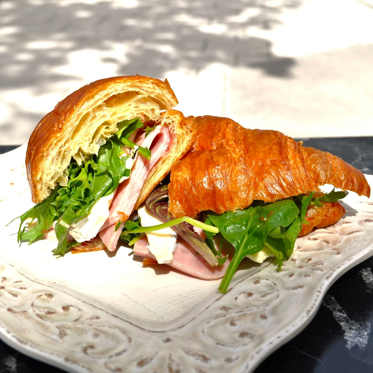 SipJavaCo's tweet photo. We love putting opposites together  - this is savory ham with sweet Bon Marne Fruit Preserves - topped with a creamy brie, fresh mixed greens on a butter croissant. 😘 https://t.co/G4mbwVzGLS