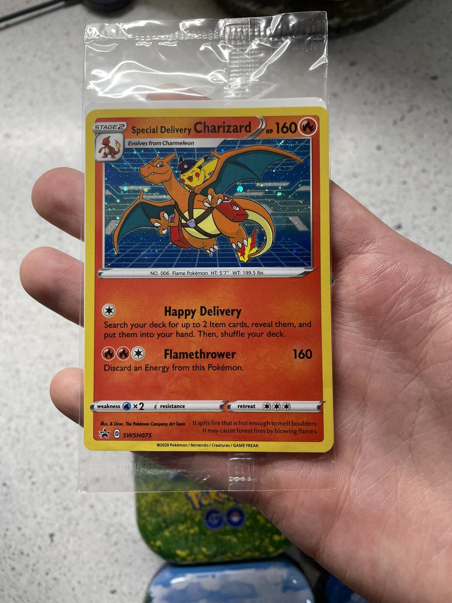 Poke_Dome's tweet photo. Just finally received my Special Delivery Charizard! I ordered it with 4 mini tins and it came in perfect condition. https://t.co/CBWdM0sSJp