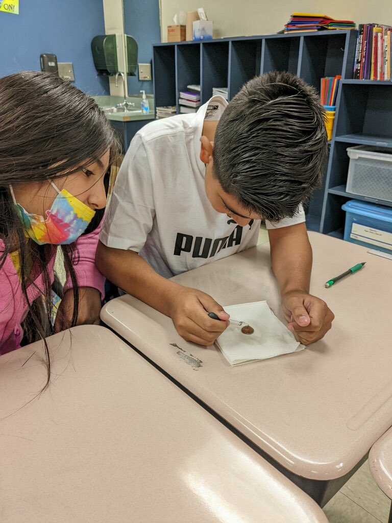 swisd_swe's tweet photo. Our 5th graders conducting experiments by seeing how many drops of water a penny can hold. #RootEdSWE https://t.co/G91SdgmWK9