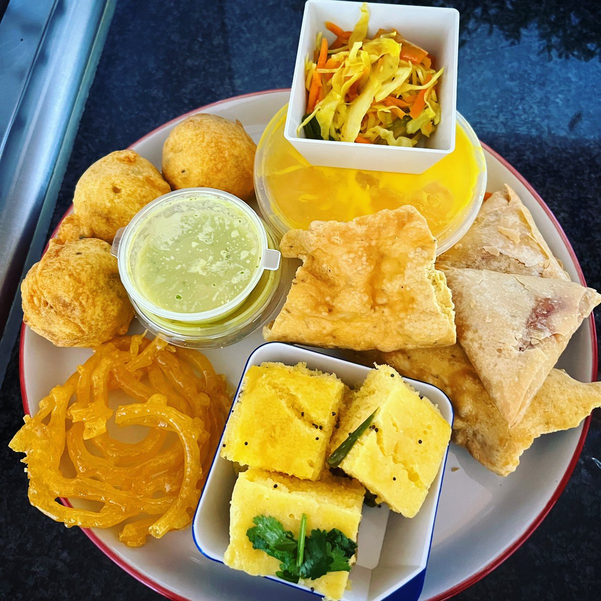 SophiePetkar's tweet photo. When your mum knows you’re obsessed with #IndianSnacks and drops a whole feast off… 🇮🇳 #GujjuFood #Gujarati #Nasto #IYKYK https://t.co/fCbvrL6Pql