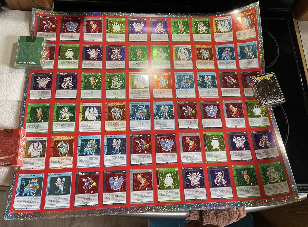 Poke_Dome's tweet photo. Just received my Metazoo Kickstarter boxes &amp; sheet! I couldn’t be happier with how it all came, the uncut sheet is absolutely amazing! Thank you @MetaZooGames @MetaZooTCG @Kickstarter https://t.co/y0QZISgNHL