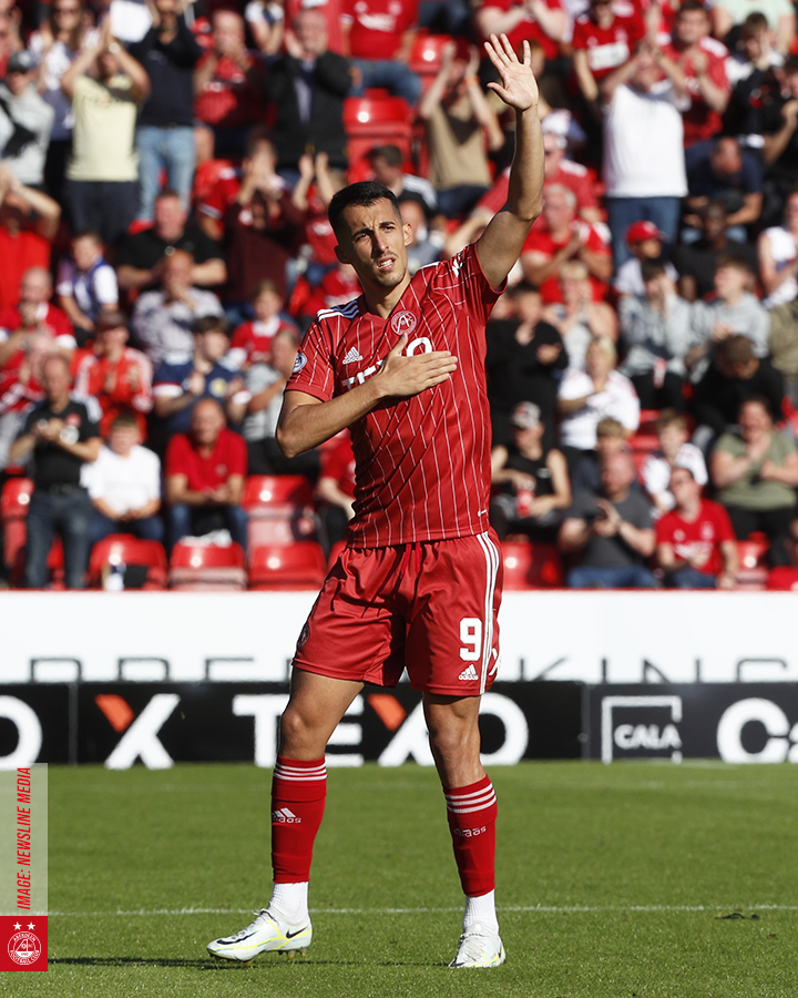 Bojan Miovski applauds the fans as he is substituted. 