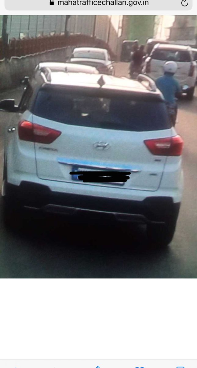 zarnashahh's tweet photo. So I recvd this challan today for ‘without seatbelt other than driver’. Even after complaining, it says it is clicked by officer on duty. Firstly, i was only one in the car. Second, I WAS WEARING A SEAT BELT.??! What is the solution to this? @MumbaiPolice @MTPHereToHelp https://t.co/gYpQsbzSOF