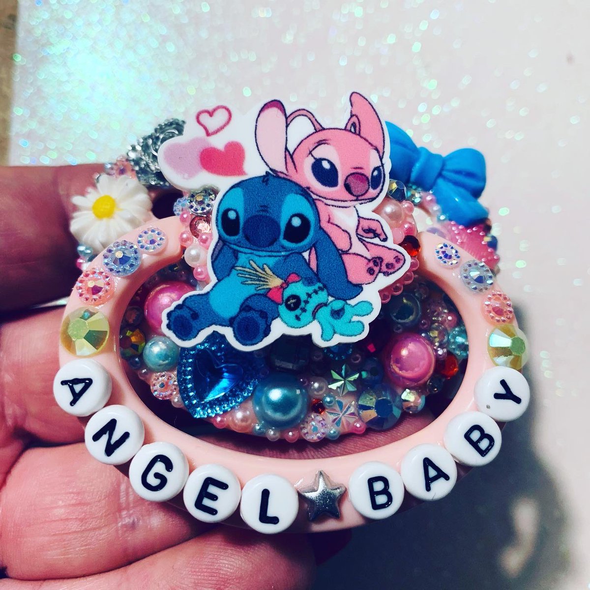 kinksparkle's tweet photo. How cute is this recent Angel & Stitch custom?! Please get in touch if you’d like to order!
.
#adultpacifier #ddlg #abdl #mdlg #ddlb #mdlb #daddykink #mommykink #littlegear #paciseller #adultpaci #adultbinkie #cgl #littlecommunity #custompacifier https://t.co/yNA1KWqZtp