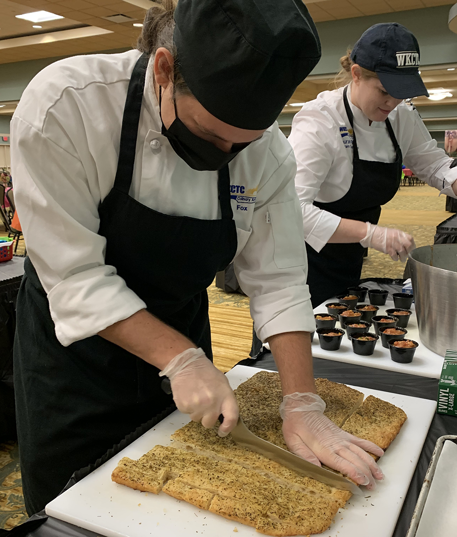 WKCTC's tweet photo. Come to the Empty Bowls Project going on now at the  Carroll Convention Center in downtown Paducah. Pick out a beautiful ceramic bowl, and sample foods from local vendors, INCLUDING our own Culinary Arts students! The event runs to 2 PM, and proceeds go to Community Kitchen. https://t.co/T6YXdBbIAX