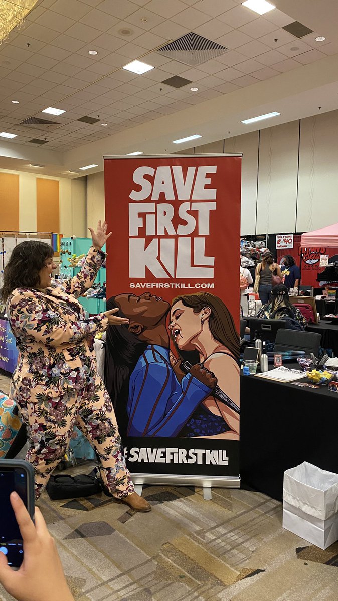DanaPiccoli's tweet image. How cool is this. Already lots of folks gathered at this awesome booth. #SaveFirstKill