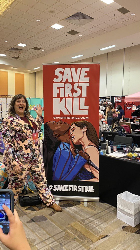 DanaPiccoli's tweet image. How cool is this. Already lots of folks gathered at this awesome booth. #SaveFirstKill