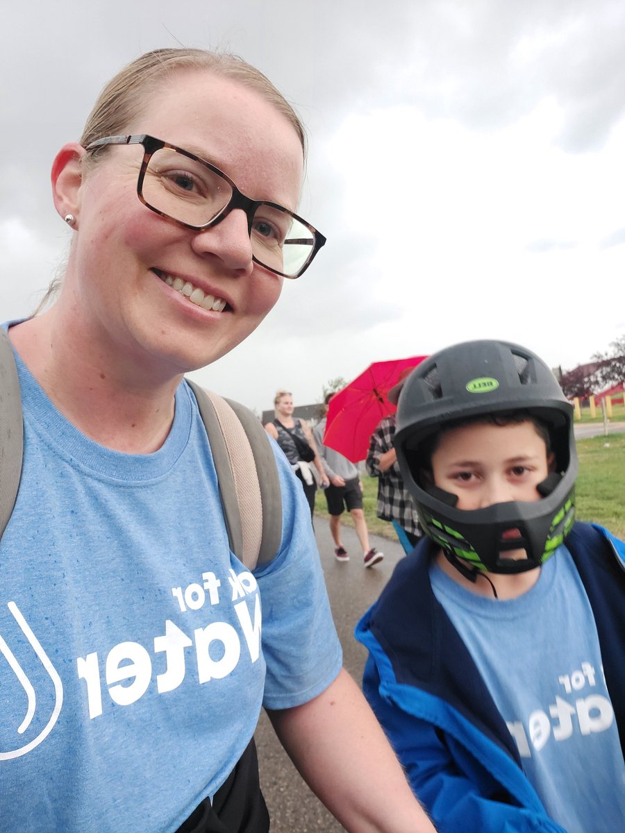 GRAugustin's tweet photo. Today Elijah and I did our Walk for Water. It poured rain while we walked our 6 km (average distance walked for water). It is a small inconvenience compared to what kids and families face to find some form of water in countries with little access to water. https://t.co/zS45EbQwiz https://t.co/ske6TgLicH