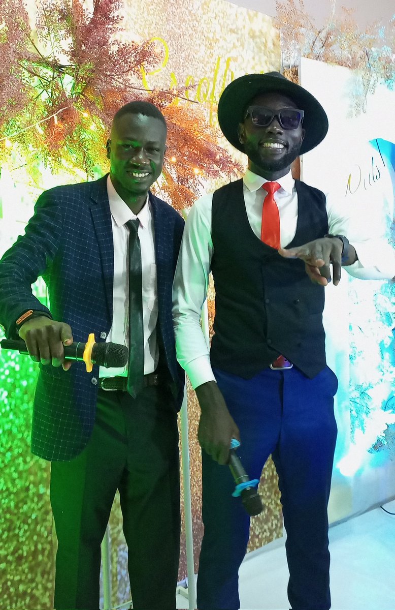 DrHilaryOkello's tweet photo. With my brother Pius on the mic. 🎤 Congratulations Geoffrey &amp; Rose ❤️
#MC
#ComedyEverywhere https://t.co/tdjPQ6OFW1