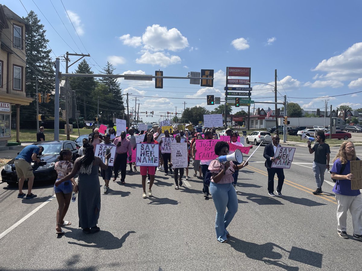 dtbusiness's tweet photo. Marchers walk along Chester Pike in #sharonhill on the year anniversary of the shooting death of 8-year-old Fanta Bility #justiceforfantability #fantability https://t.co/RB3yvkr9da