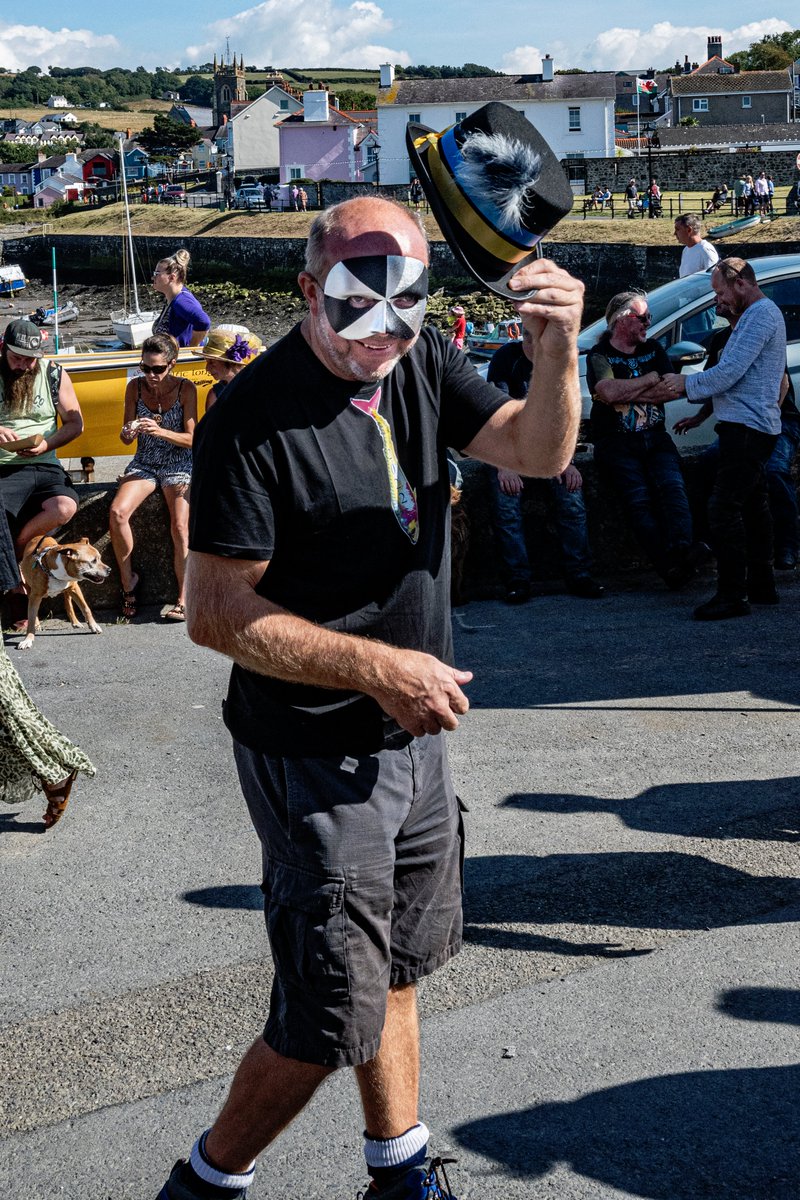 achittock's tweet photo. A lighthearted funeral dedicated to the humble #Mackerel at the end of the #fishing season. The 24' Mackerel is carried by 6 bearers and wailing widows #Aberaeron   #festival #wales #sunset #tradition https://t.co/FinYub98J8