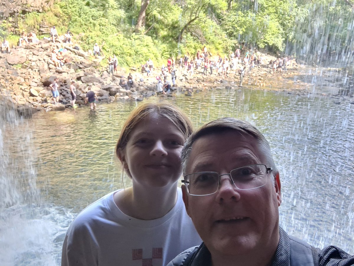 DavidAMilburn's tweet photo. A great family day out with #thing2 and family plus #thing3 in one of my most favourite places - #Ystradfellte. Clear drought in play as Sgwd Yr Eira had little water running over it. https://t.co/oWRJ4BWS1S