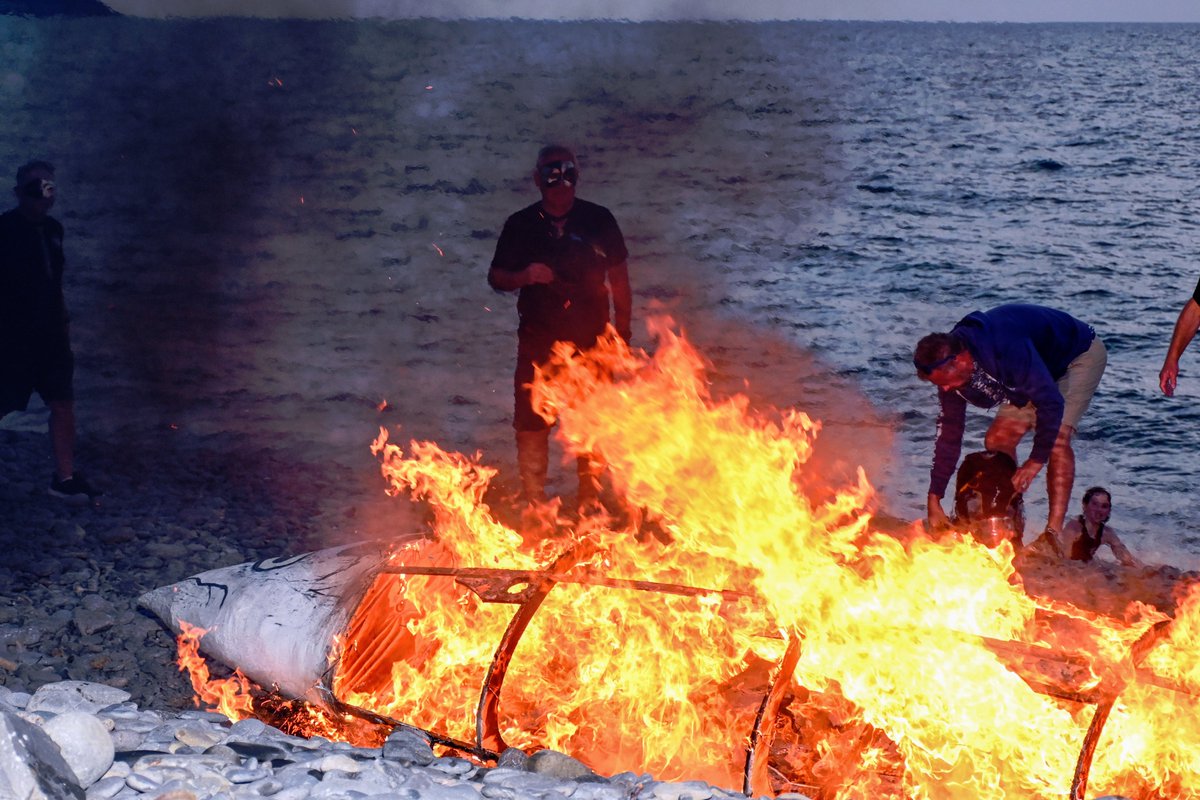 achittock's tweet photo. A lighthearted funeral dedicated to the humble #Mackerel at the end of the #fishing season. The 24' Mackerel is carried by 6 bearers and wailing widows #Aberaeron   #festival #wales #sunset #tradition https://t.co/FinYub98J8