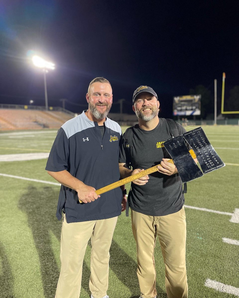 Coachclintburns's tweet photo. Incredible game last night for the 124th installment of the #battleoftheax!! Hat is off to the bearcats for way they played. Owen and Rooster were excited to get the photo op with the hardware! https://t.co/EH8OaOw84t