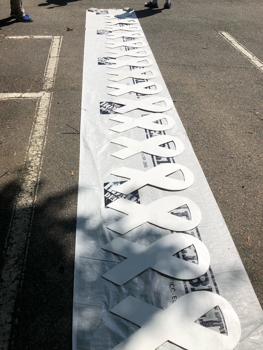 AmLungCSI's tweet photo. #UNC ALCSI had a white ribbon build today with @chrisdraft and The White Ribbon Project!! Thank you to everyone who helped cut, paint, and sign the ribbons! We love that @TheWRP4LC shares ribbons built with love and care to raise #lungcancerawareness. @heidi_onda @bjork5 @UNC https://t.co/ucxYS9T1Fi