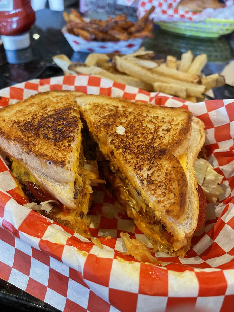 More evidence that Texas is great - cheeseburger where the bun is made of grilled cheese sandwiches…brilliant.