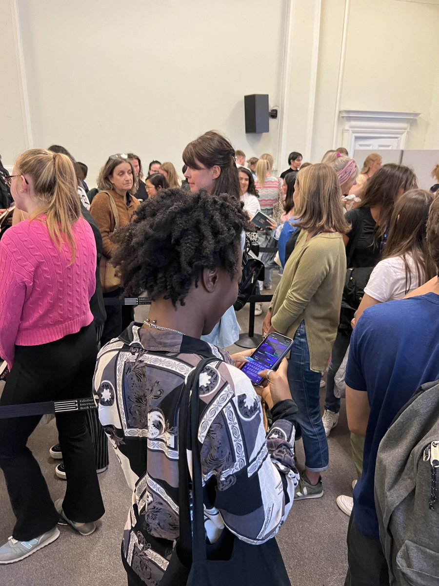 shand_kathy's tweet photo. This is the very long signing queue for Ocean Vuong @edbookfest . I am so not surprised #timeisamother #poetry https://t.co/0gsRWiuJP7