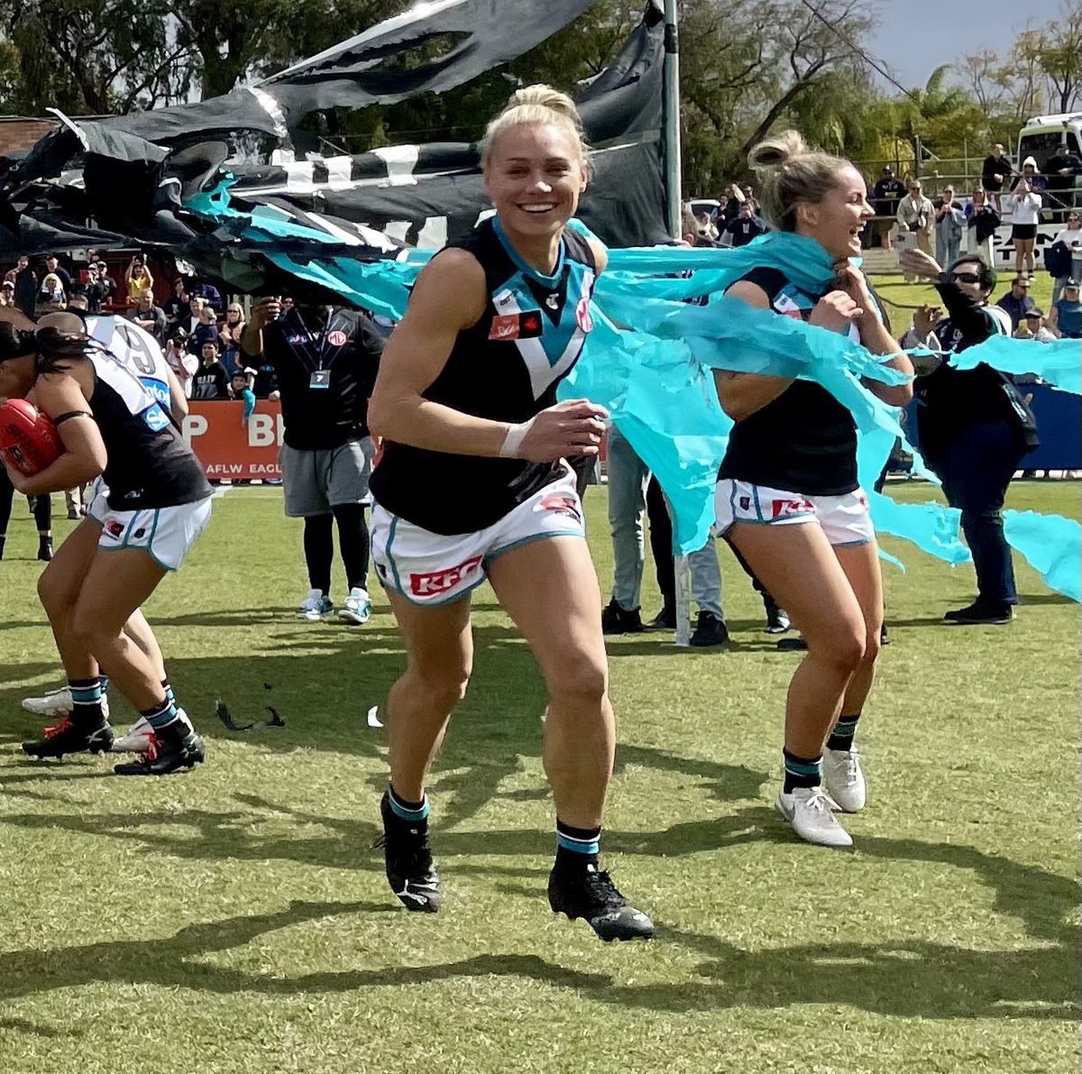 For @pafc_w 1st @aflwomens game  I realise I had the best seat in the ground as the team broke the banner - this photo will be my favourite for many years to come & I realise how great my WA @PAFC supporters are👏🏿👏🏿👏🏿@maartychokito @Jeaksy1 @erinphillips131 #herstoryinthemaking