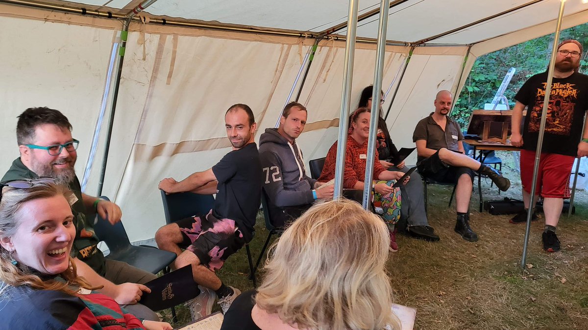 BloodClocktower's tweet photo. Clocktower: Camping style 😈

More of Daddy Ben out and about, this time out in the great outdoors at the Strange Games Festival happening this long weekend in Sussex 🇬🇧

#boardgameweekend
#boardgamelife
#murdermystery done differently 
#bloodontheclocktower 

💜 Andy

❤️🩸🕰 https://t.co/jzbx41go5s