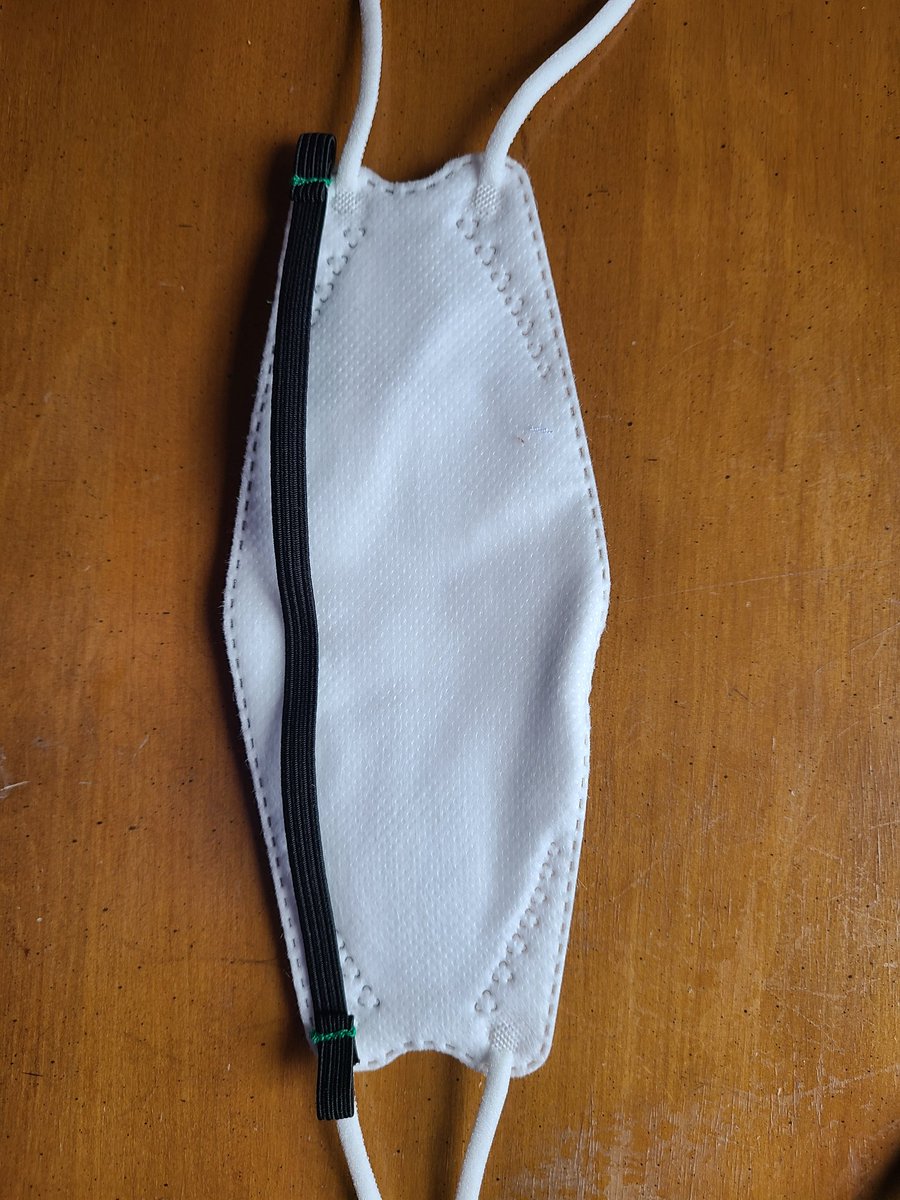 Bottom strap overlayed on mask