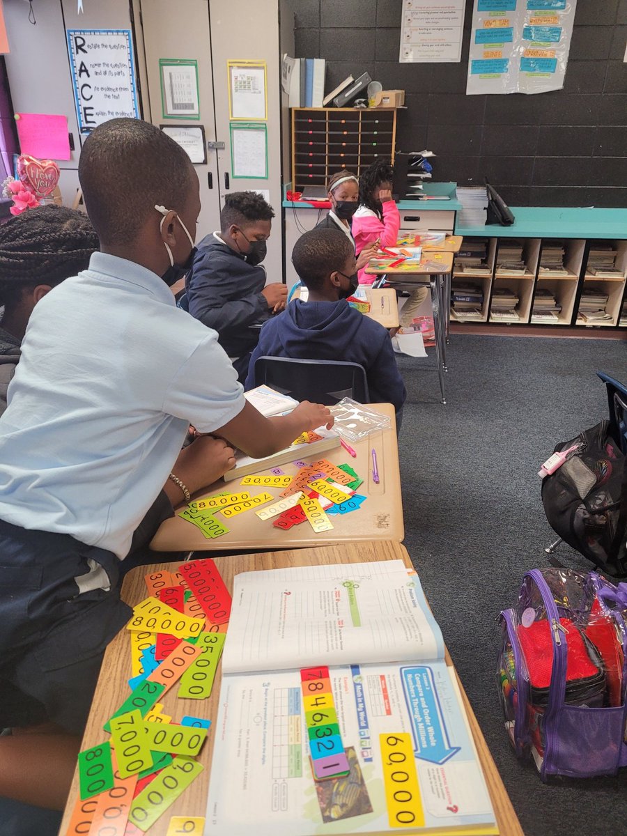 SophiaPKingston's tweet photo. Check out our PAWsome 4th and 5th grade scholars using place value manipulatives while learning how to order and compare numbers. #TeamSelmaConnected #TeamSPK #higherseasahead https://t.co/aCq4Anlegs