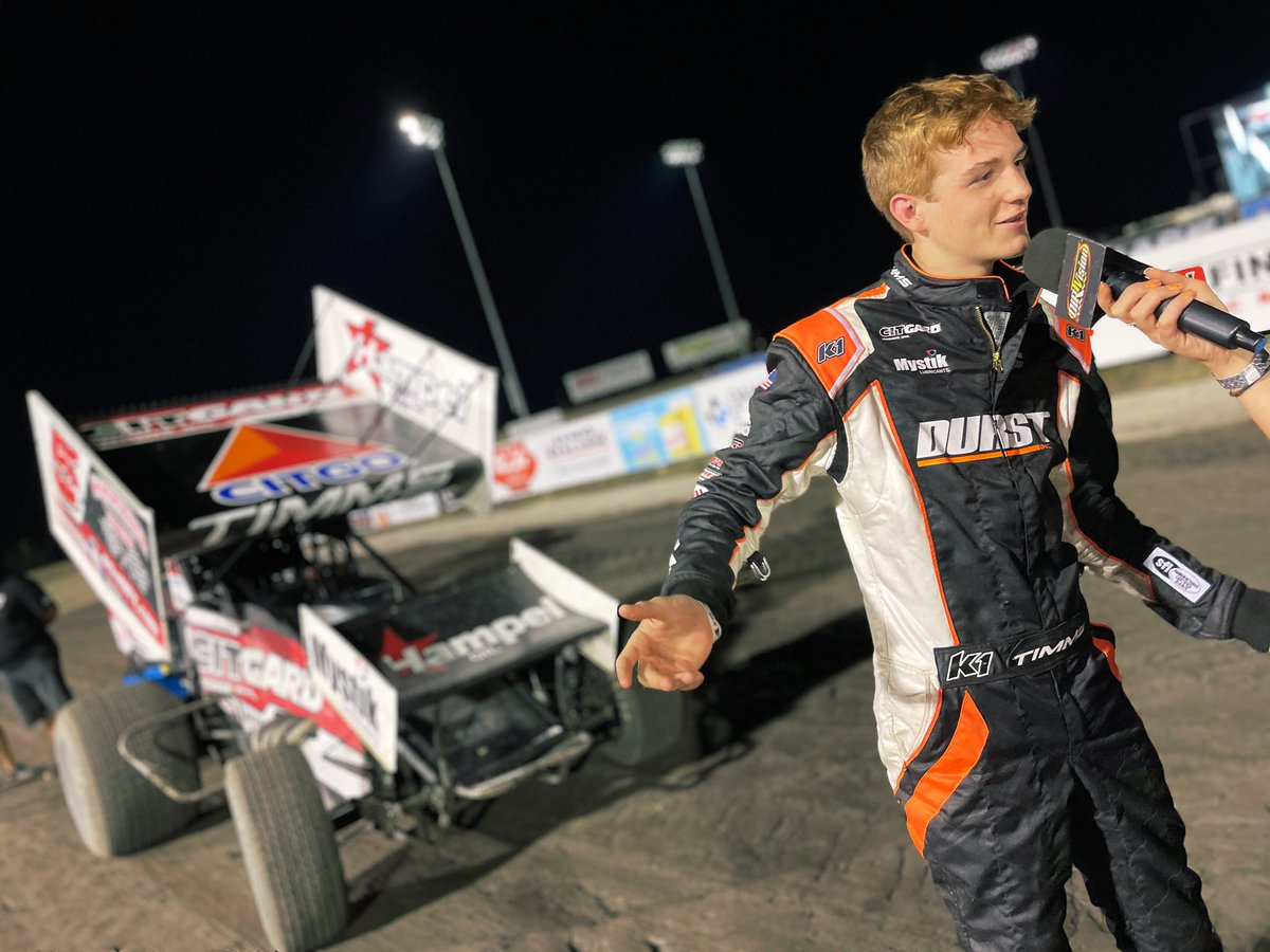 WorldofOutlaws's tweet photo. At 16 years and 1 day old, @RyanTimms_5T is officially the youngest podium finisher in World of Outlaws history, breaking the record set earlier this year by @corey_day_.

He ran third most of the race before driving around @BradSweet49 on the final restart. https://t.co/HYVgfaZuY4
