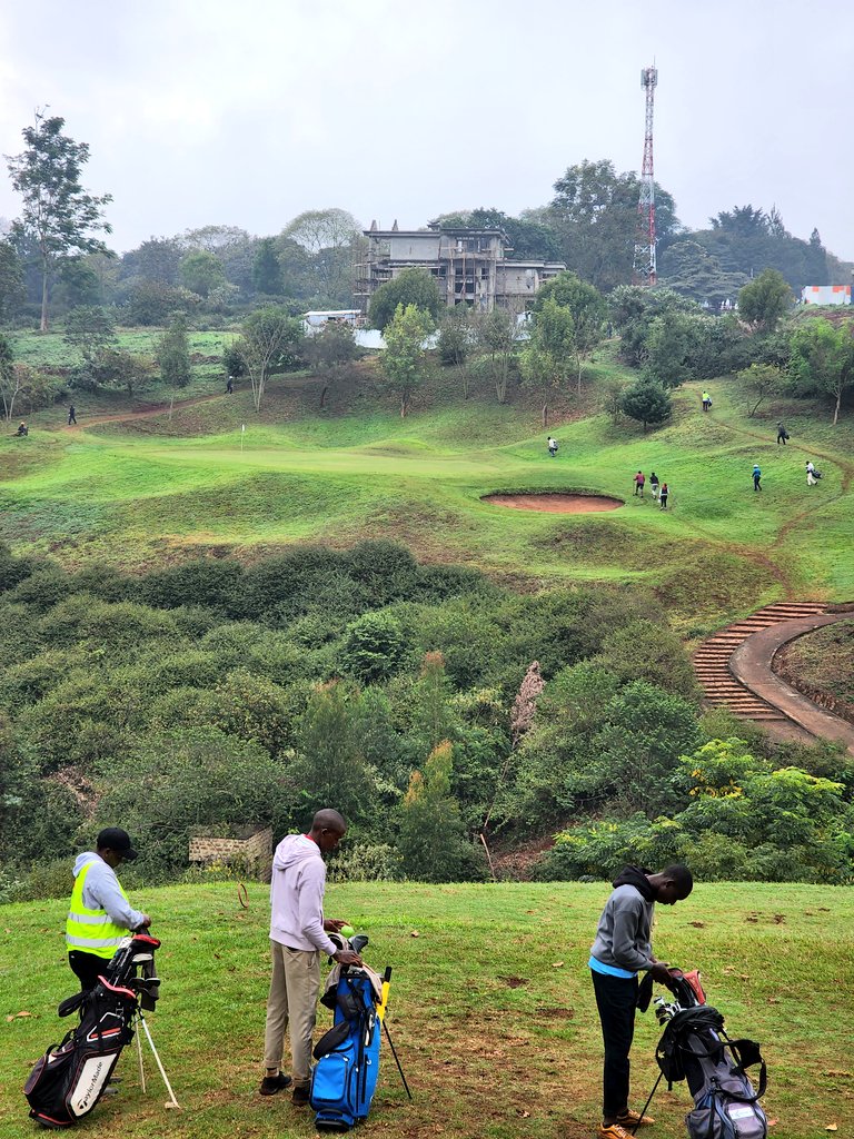 CharlesGacheru's tweet photo. The Par 3 5th at #Migaa is another hike! No bail out area, go across the ravine or go home. The descent from the tee box is a knee knocker and the climb to the green requires hiking shoes, strong glutes, even stronger calve muscles, a strong heart and large capacity lungs! https://t.co/U7aB3cEpwt