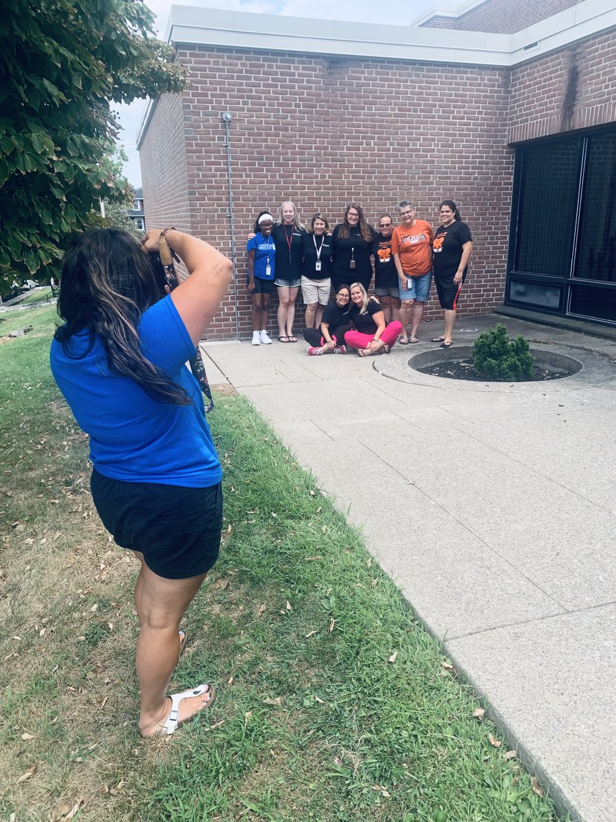 FHE's theme for this school year is "Leave your PAWprint." Staff left their print on our mission statement and posed for team pictures!🐾📸 #ItsAThrillOnTheHill #HillHappenings #BASDProud