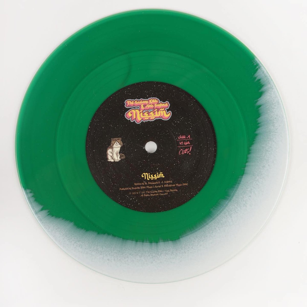 CUSSRECORDS's tweet photo. TEN YEARS LATER! Limited Edition "NISSIM" color in color/half n half 7" in deep purple &amp; cyan or kelly green &amp; white w/ “NISSIM LIVE” on the B-side! Available at Midnight PST on Wednesday August 31 on CUSS ft. brand new commemorative 10yr anv artwork by @AlejandroSordi 🌈🌙🌴🔥🗡 https://t.co/yEjWRob6af