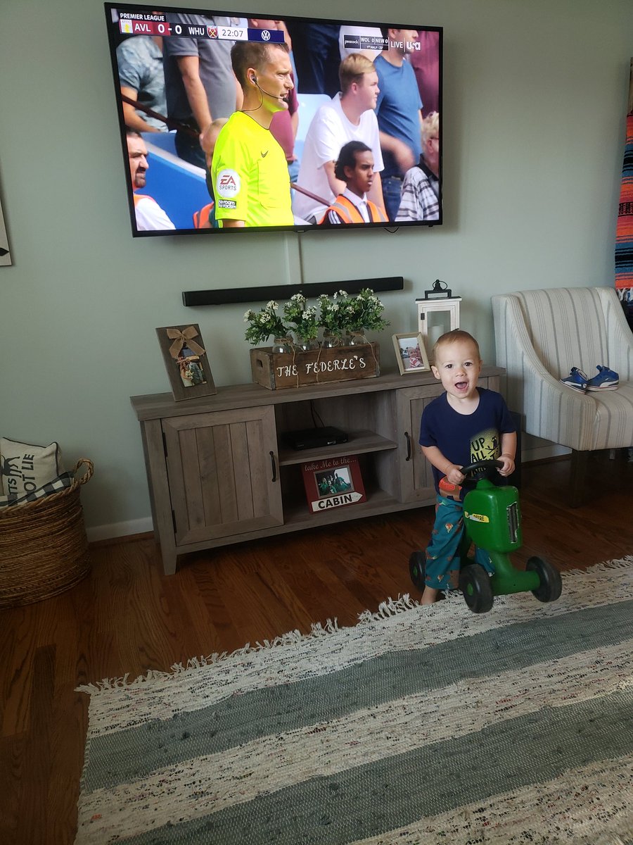 MrsRedlegs's tweet photo. Just a boy. Cruising on his tractor. Watching a little soccer. Great start to the day! 😄 #MyPLMorning https://t.co/1XrGlB4Xhm