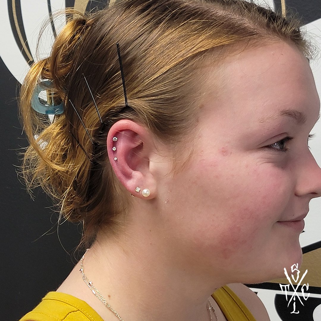 steelandInk's tweet photo. It's almost fall, but Fino isn't done bringing the heat!
Combining the triple helix with the double lobe piercings is sure to turn some heads!
Stop by if something like this interests you! We do walk-in piercings every day! #piercings #earpiercing #stlpiercing #stlpiercer https://t.co/UbUG8k0jQv
