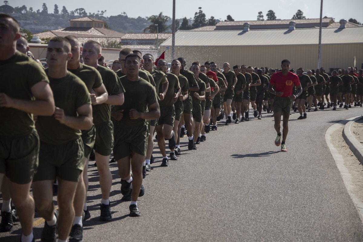 USMC's tweet photo. #Marines run in formation during a motivational run to celebrate the new Marines of Alpha Company, 1st Recruit Training Battalion, at @MCRD_SD, Aug. 25.

The motivational run is the last physical fitness event conducted in recruit training.

#USMC #RecruitTraining https://t.co/WsmMbfsYKr