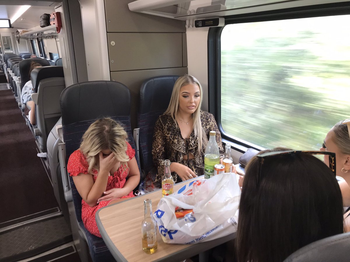 Woman (right) on train from London to Norwich. Drunk out of her head. Shouting and swearing in front of children. Challenged her, and was threatened with a bottle in my face. Paging <a href="/greateranglia/">Greater Anglia</a>.