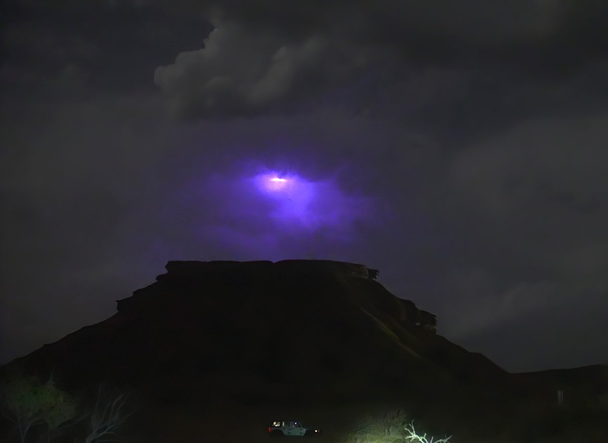 A very unusual transient blue glow in a storm tower in Oklahoma. I have caught maybe a dozen similar events over the years, but still don't have an explanation. Looks like maybe bipolar leader development at the edge of cloud, but why blue color and why such a big area of blue?