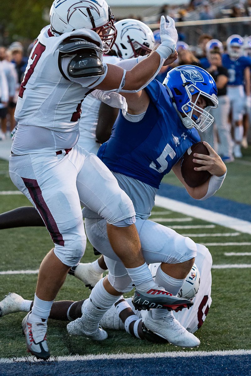 Photo of the week:

Thanks to Randy Cutshall Photography 

This is a photo of Senior Ryan Clark running for a touchdown in Friday nights game 

You could say the defender was “taken off his feet”

Go Roos! 

<a href="/RyanWalkerClark/">Ryan Clark</a>
