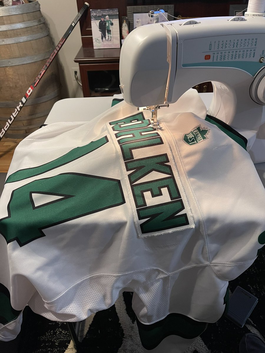 DaveWestbury's tweet photo. It’s that time of year again. Sewing name bars on the rookies jerseys and a couple number swaps for some vets. So happy to be back in the swing of things. Camp is underway. First non-conference game is a couple weeks away. LET’S GO!!! #HuskiePride @HuskiesWHKY https://t.co/hFgLvmCZFI
