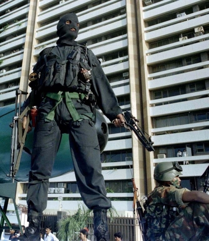GreyDynamics's tweet photo. Indian Navy Marine Commando (MARCOS) looking rather menacing with a crossbow in one hand and a MP5A3 sub gun in the other during the late 90s.
#India #MARCOS #Navy #HK #crosbow https://t.co/nVM2MjaPfi