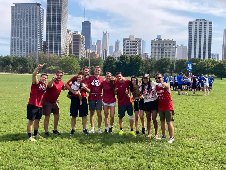 Bridge_Danielle's tweet photo. These Chicago Hogs represented Arkansas well in the #SECAlumniFlagFootballTourney 
I think @CoachSamPittman would be proud! Peep the littlest hog fan in white 😍❤️🐗🐗
#WeAreTheChampions #Chicago #Razorbacks #GoHogs https://t.co/DBcu7kfLeI
