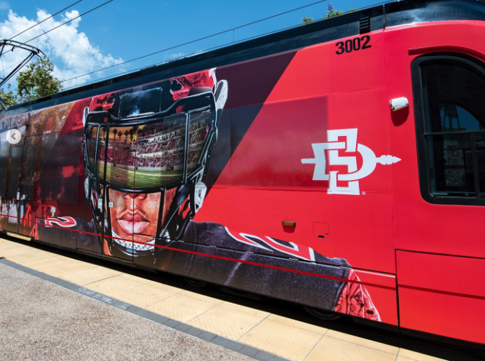 passport_sd's tweet photo. Ride the @sdmts trolley to SDSU Aztec football games and other events at Snapdragon Stadium this fall! The Stadium Trolley Station is on the Green Line. Check out the Trolley stops here: https://t.co/QIlD1INemT
#sdmts #snapdragonstadium #mtstrolley https://t.co/0C3OlODE84