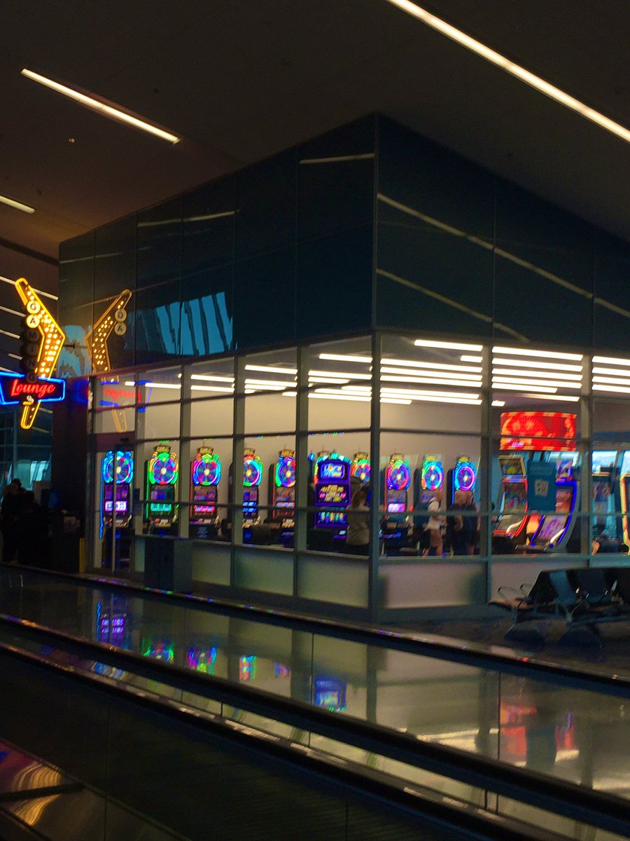 bombsbits's tweet photo. They have improved the slot/smoking lounge at the E-gates @LASairport since our last visit and we just saw someone win $10k on #BuffaloRevolution … it made them about even for the trip 😂 #slots #Vegas https://t.co/3eY7LB8pDj