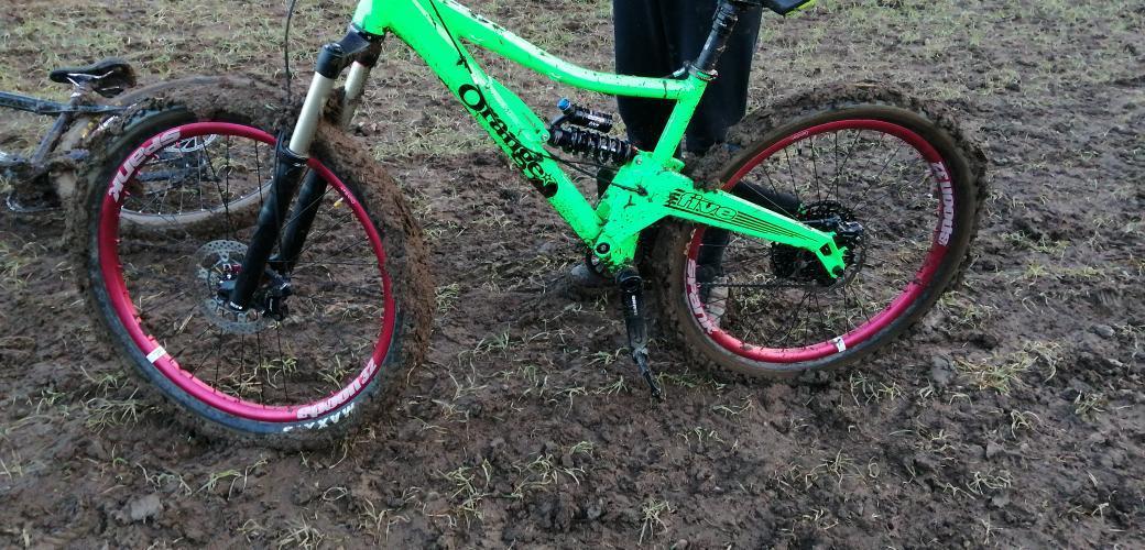 This distinctive (lime green 'orange' with custom red wheels) mountain bike was stolen from our locked car bike rack in Bristol last night. It is my teenage sons pride and joy. He built it himself, piece by piece, over lockdown. Please let me know if you see it. Thank you!