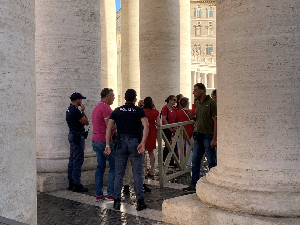 Women’s ordination advocates came outside the hall where Pope Francis is meeting with the world’s Catholic cardinals with messages written on red parasols. The police are now questioning them. (One is my wife, ⁦<a href="/dearmisskate/">Kate McElwee</a>⁩)