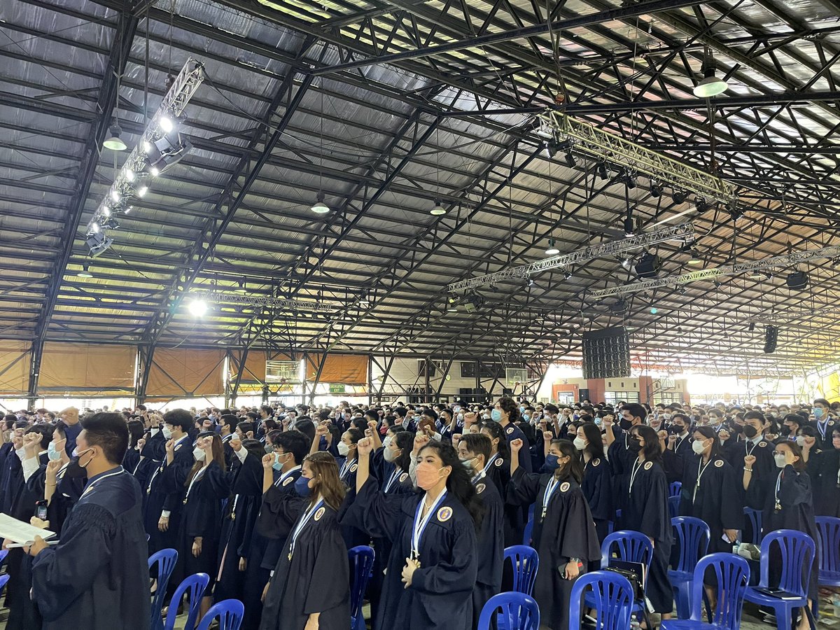 Gap_TheGUIDON's tweet photo. To conclude their graduation rites, the SOSS graduates join one another as they sing the Song For Mary. | @TheGUIDON https://t.co/gZ62JQY5A9