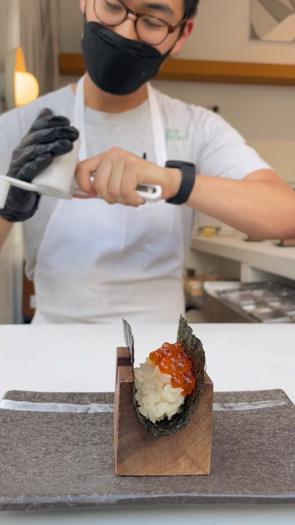 tablehopper's tweet photo. Grated frozen ankimo over an ikura handroll at the new @handrollproject. 💥 Jackpot 🎰! 

#handrollproject #temaki #handroll #nori #ikura #ankimo #monkfishliverpate #makeitrain #jackpot #missionsf #themission #newrestaurant #sfeats #tablehopper https://t.co/Jkt88hgIIa https://t.co/JSn0dnd8g6