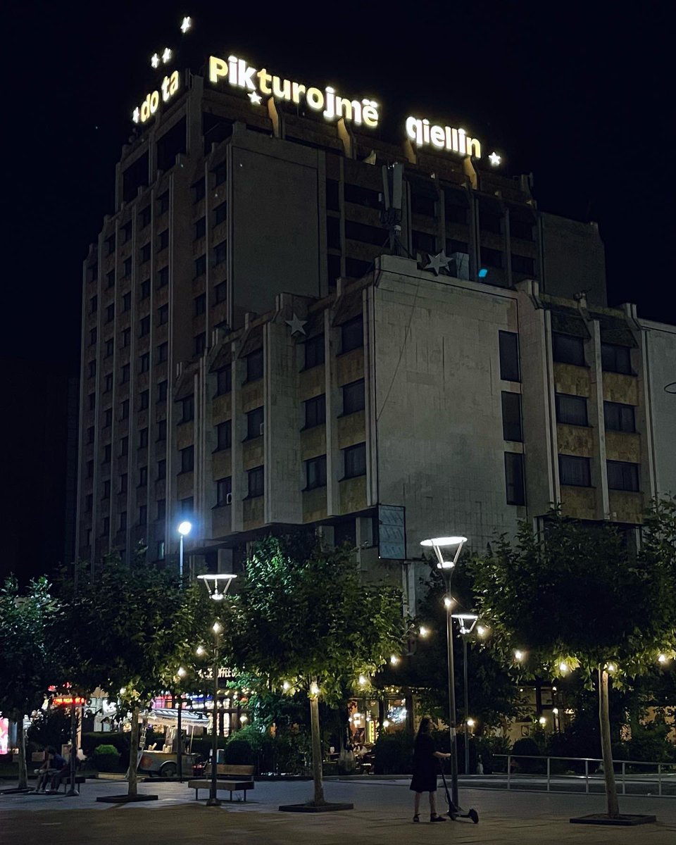 kreshers's tweet photo. @xixellojme with his phenomenal creation at Grand Hotel Prishtina. “When the sun goes away, we shall paint the sky” glowing during #Prishtina summer nights &amp; replacing the old signage of 5 ⭐️ for a hotel that had long ceased to be a five-star establishment. #manifesta #kosovo https://t.co/zRetEGxKRe