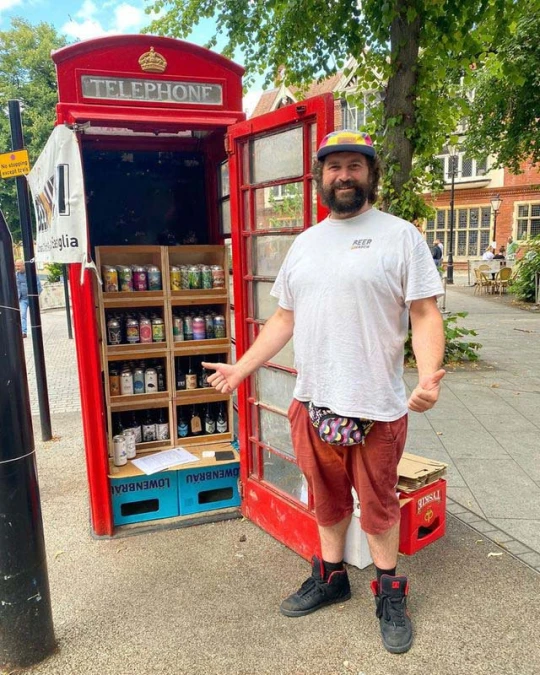 MetroUK's tweet photo. Saul Press has opened The Beer Hatch, which operates out of a couple of old phone boxes in Tombland, Norwich.

Punters can’t actually fit inside (unless you’re a keen acrobat as well as a beer lover) but it’s packed with booze, and that’s what really matters 🍻 https://t.co/h56NRYrjhX