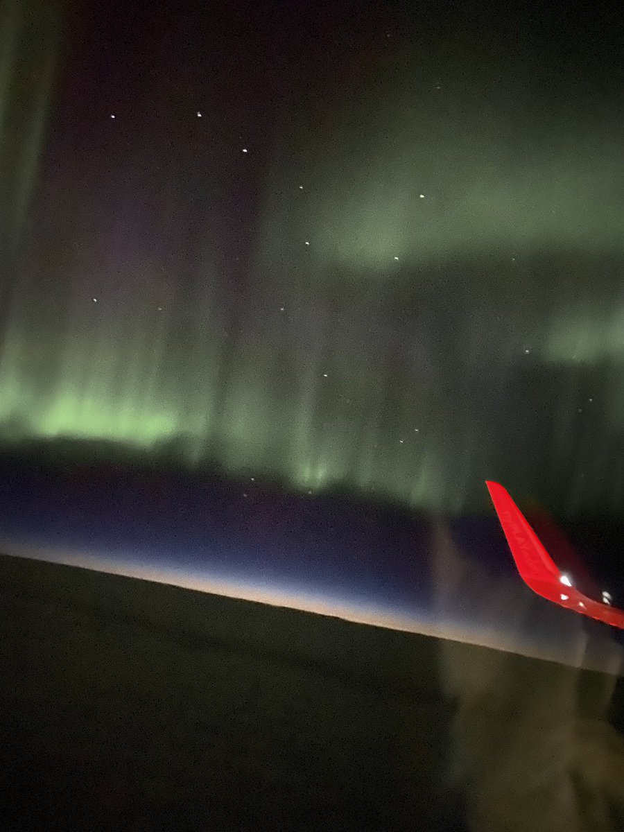 aurora borealis from my plane window… somewhere over iceland…