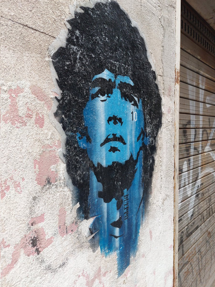 One of the pieces of street art we encountered when visiting Naples earlier in the year.

This particular one was found just off the famous 'Maradona Square'. As we have said before - We have never seen a single city as obsessed with one individual as Naples is with El Dios.
