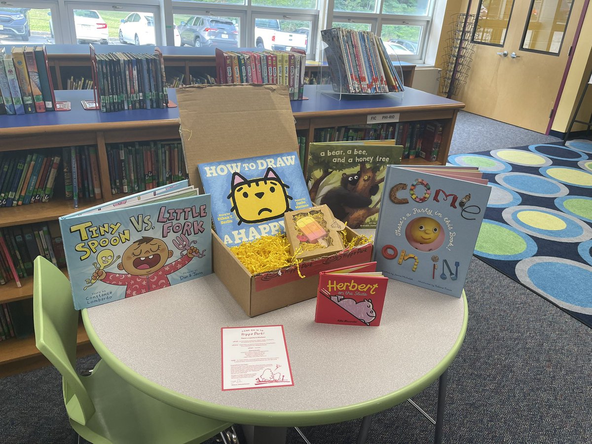 McCuskerLibrary's tweet image. First day back in the library and I was welcomed by this amazing “party in a box” from @HippoParkBooks ! Fernbrook students are going to fall in love with Herbert and have a blast drawing happy cats! Thank you so much for the back to school gifts! @astrakidsbooks @fernbrooknj