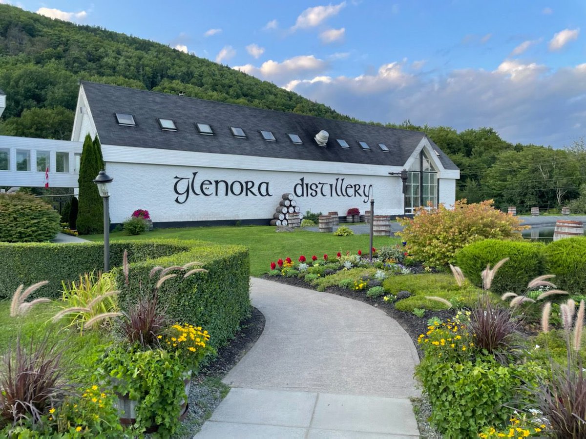 GlenBreton's tweet photo. Good morning from the Glen! Itโs the last week of August and it sure looks beautiful around here. We are lucky to see this view every day. #capebreton #glenoradistillery #whiskywithaview #explorecb #novascotia #singlemaltdistillery #canadianwhisky #gardening #glenbreton https://t.co/cFk7qzzXrv